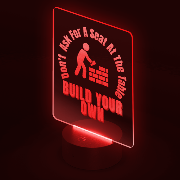 Dont_Ask_for_a_Seat_at_the_Table_Build_Rectangle_Dark_Angle_Red_Mockup.png