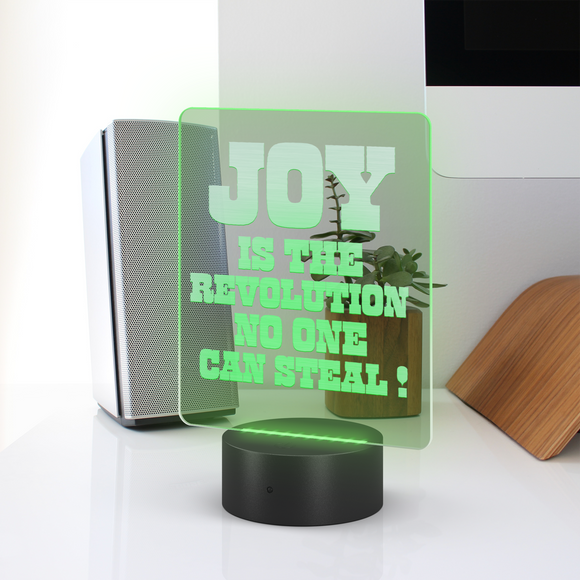 Joy_Is_A_Revolution_No_One_Can_Steal_Rectangle_Lifestyle_Workdesk_Mockup.png