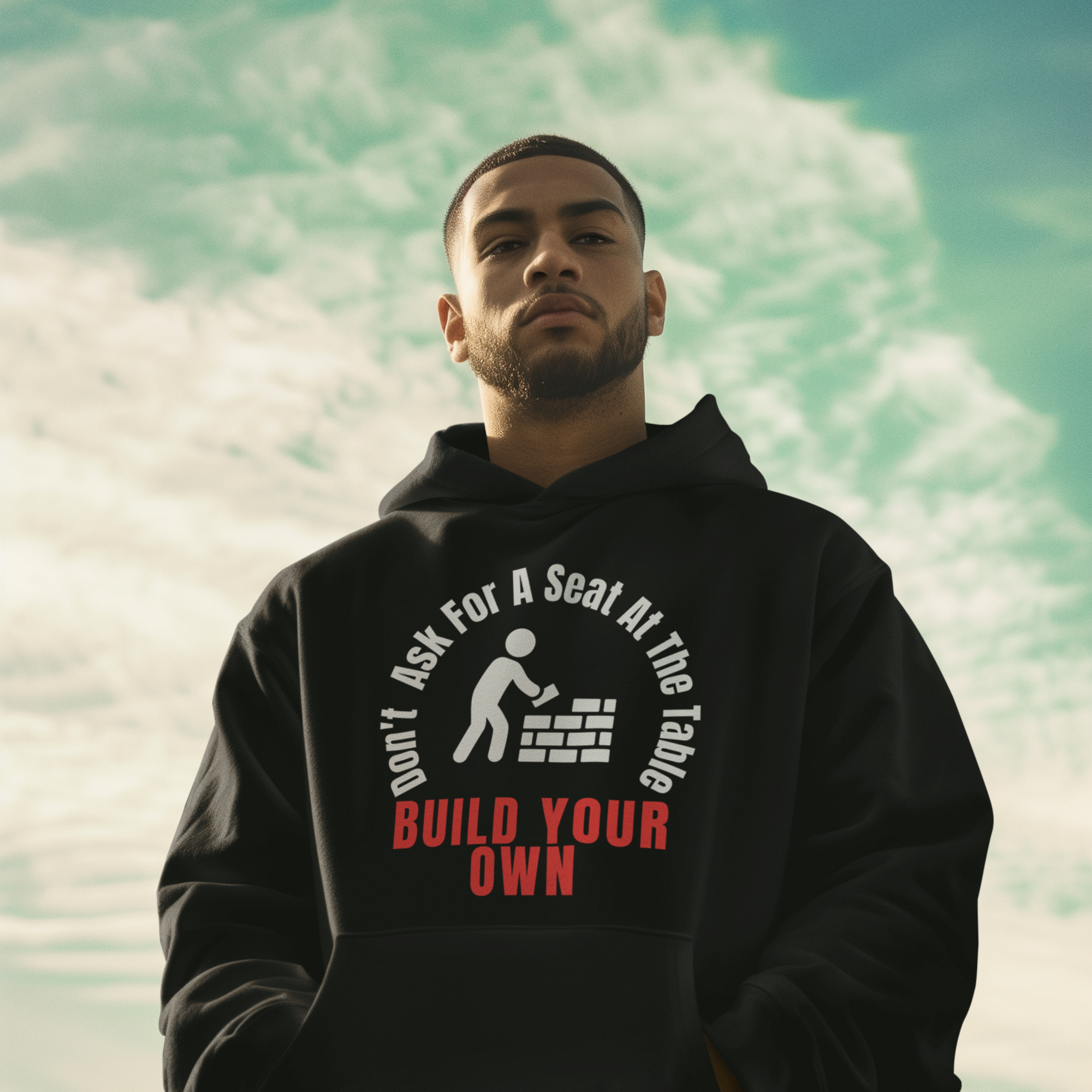 pullover-hoodie-mockup-featuring-an-ai-created-man-posing-against-the-sky-m52294.png